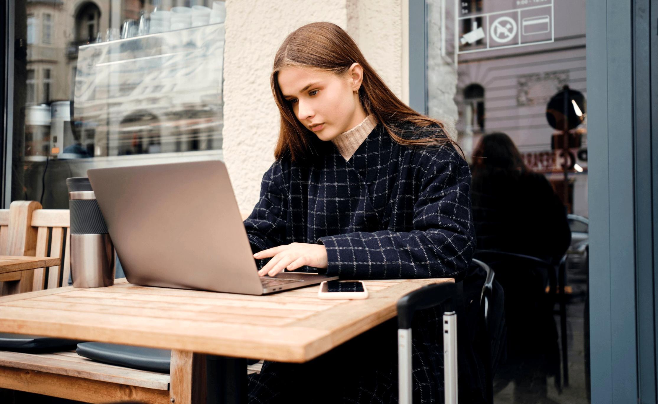 Family financial planning discussion with documents and laptop